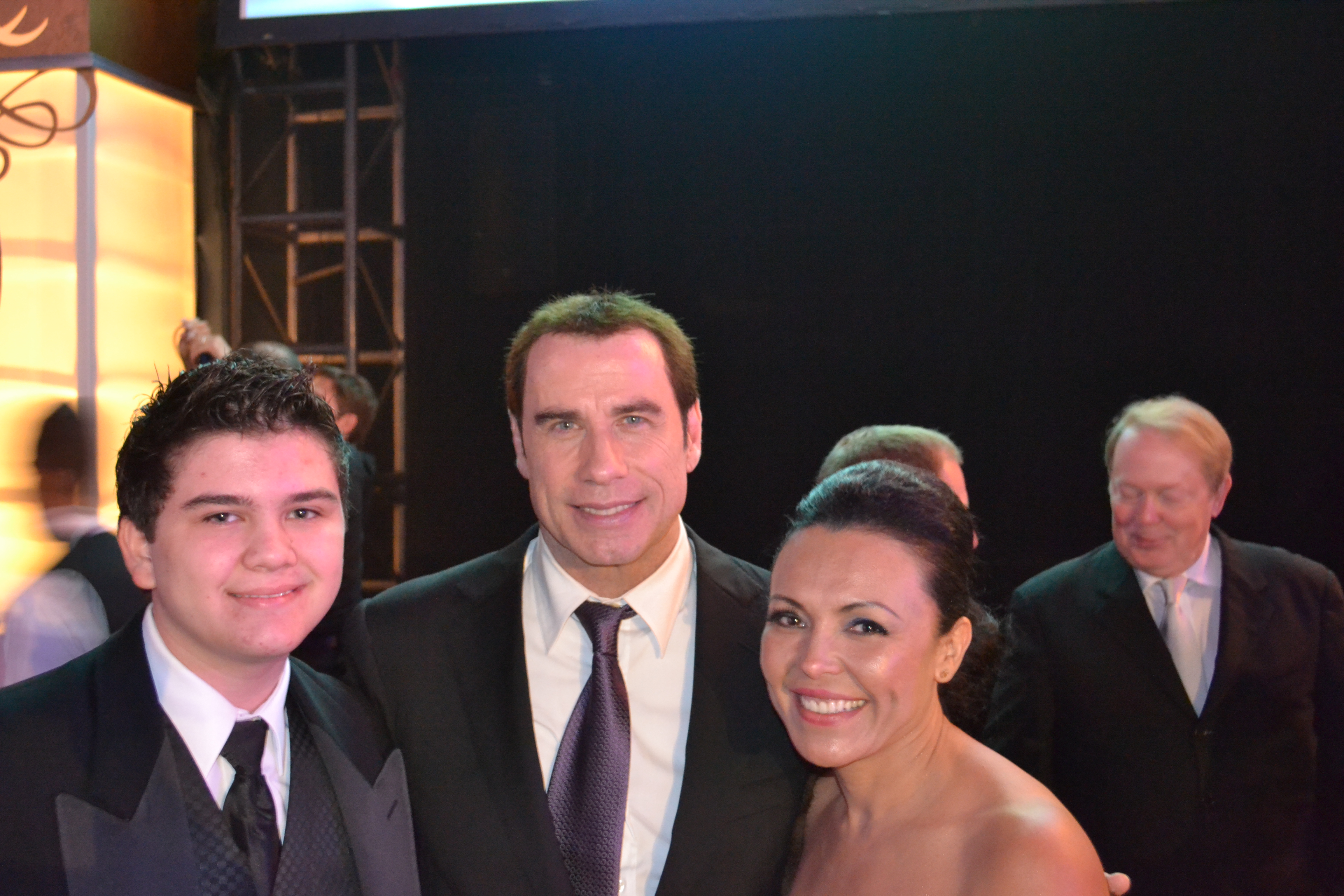 Sean Patrick Flaherty, John Travolta, and Sandra Santiago