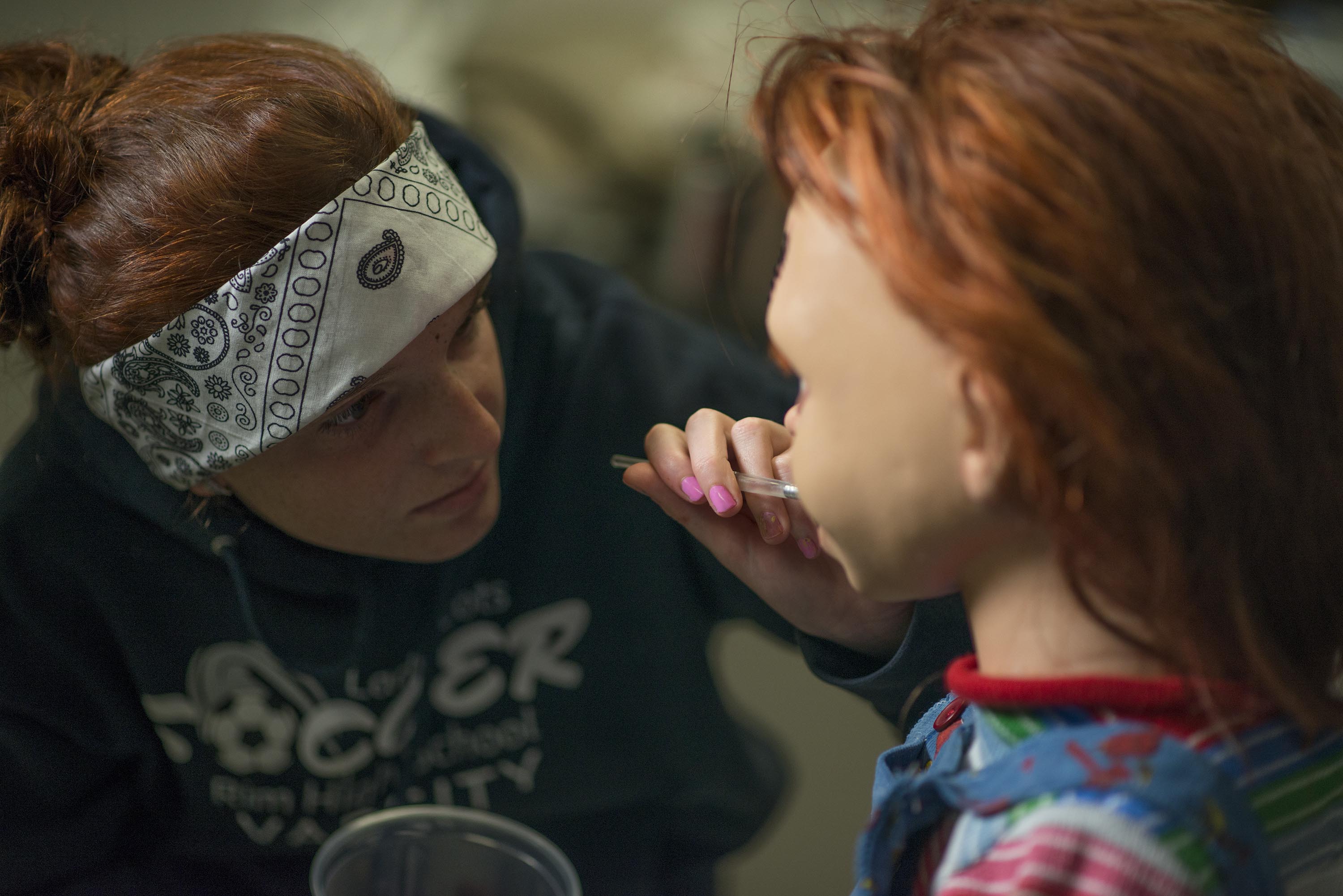 CURSE OF CHUCKY (2013) Kyra Gardner of Alterian, Inc. readies the animatronic Chucky for his closeup.