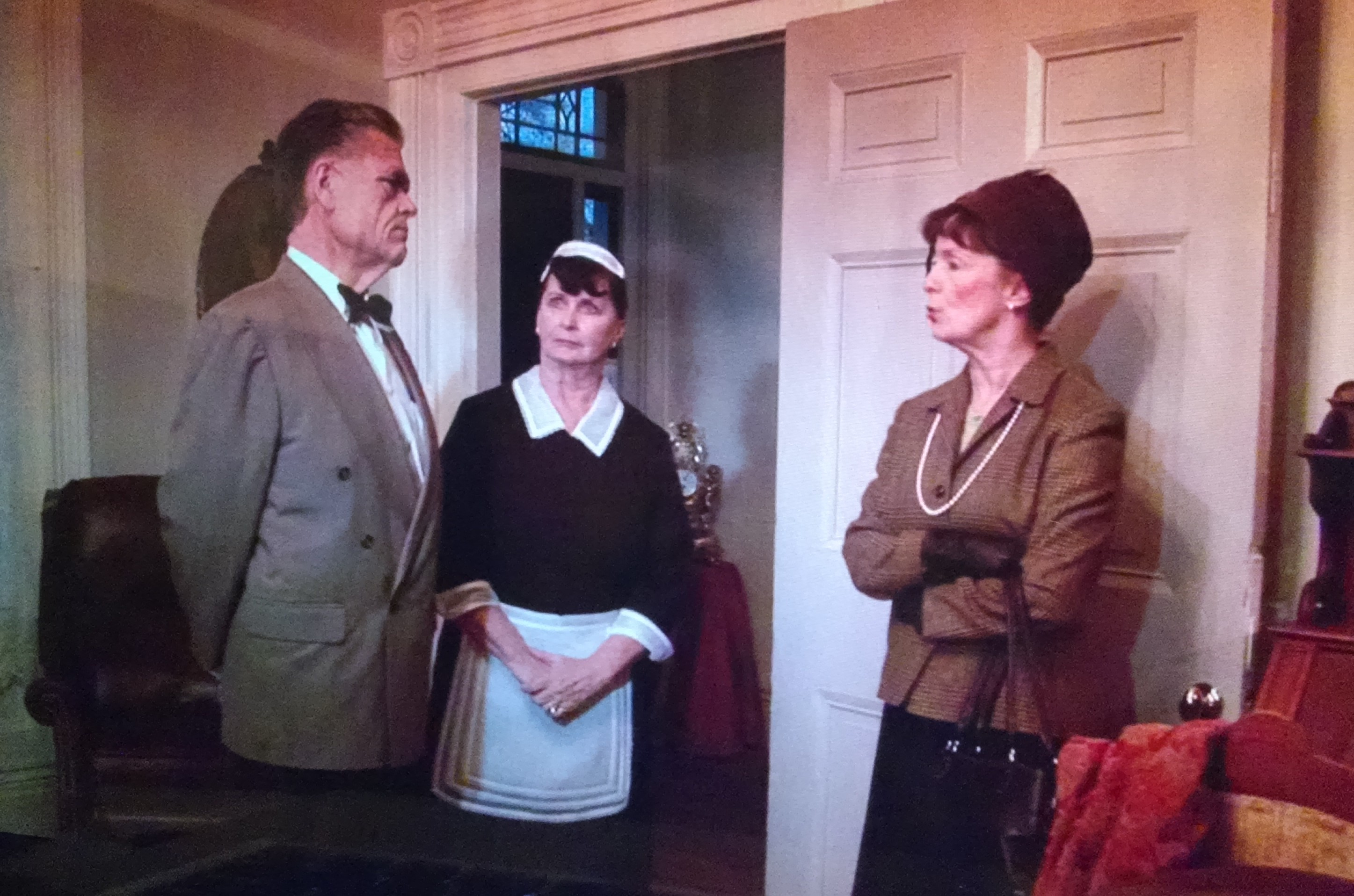 Judge Ryker (Bryan Lassiter), Mrs. Davis (Brenda Moss-Clifton) and Minnie Ryker (Joan Reilly) in Holey Matrimony. A tense moment in Holey Matrimony as Judge Ryker admits his complicity in a conspiracy that he conveniently blocked from his memory.