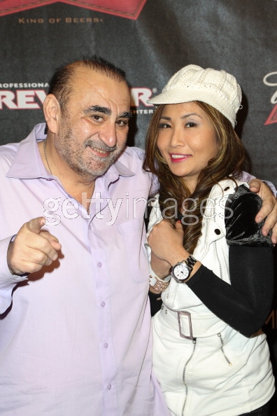 Actors Ken Davitian (L) and Tracy Mcnulty arrive at BAMMA USA's Badbeat 12 professional MMA fights at Commerce Casino on March 28, 2014 in City of Commerce, California.