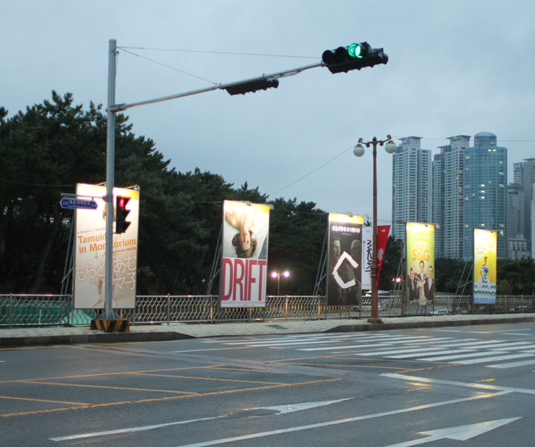 CLYDECYNIC poster as a billboard on the boulevard, Busan, South Korea