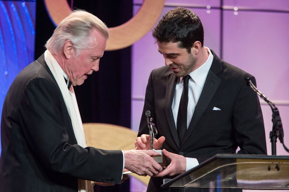 BEVERLY HILLS, CA - FEBRUARY 16: Actor Jon Voight presents the award in the student compeition to Michael Smith during the 63rd Annual ACE Eddie Awards held at The Beverly Hilton Hotel on February 16, 2013 in Beverly Hills, California.
