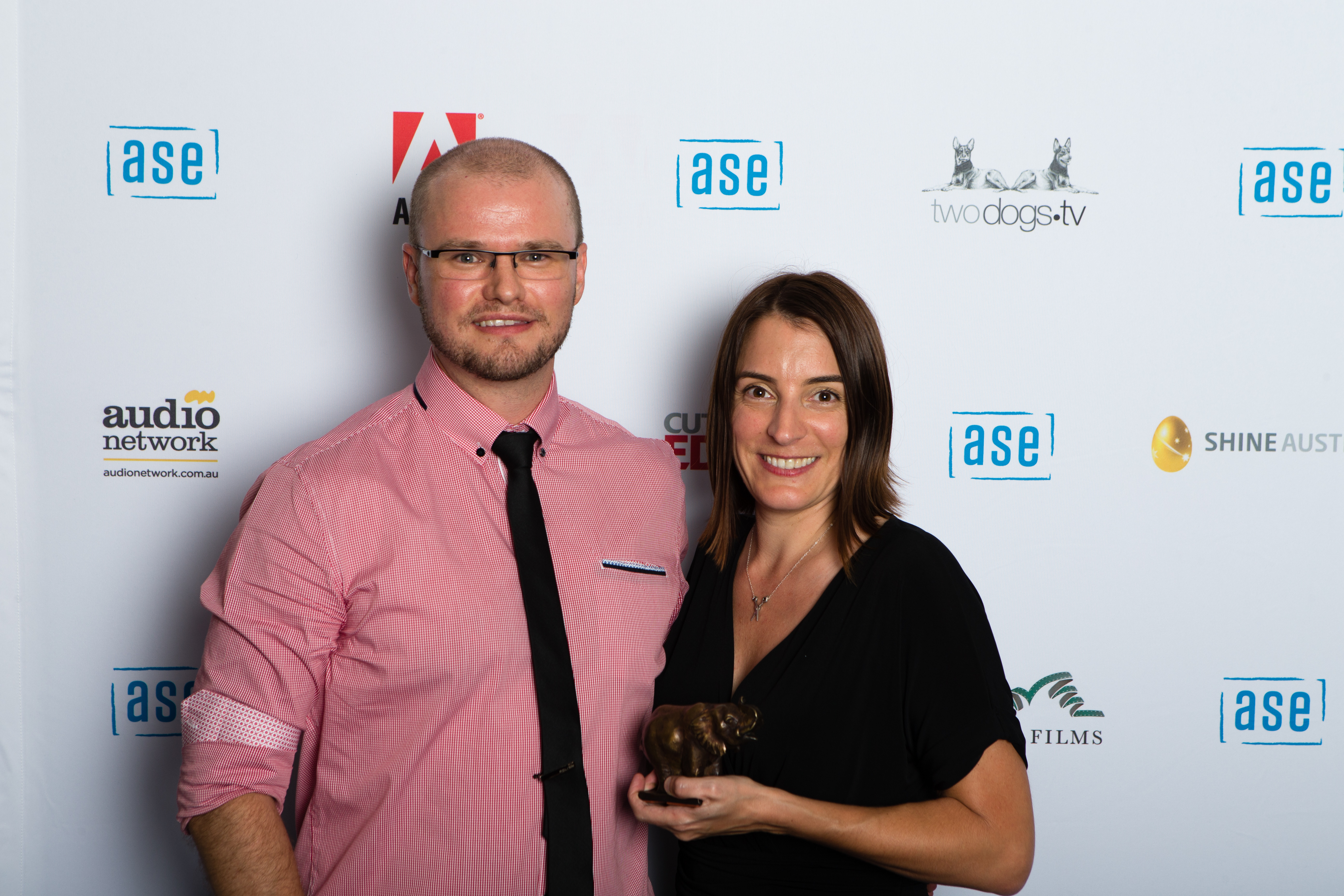 Melanie accepting the award for Best Editing in a Documentary Program at the ASE Ellie Awards 2014. With Adobe's Jon Barrie.