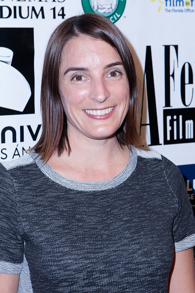 Melanie accepts the Best Documentary Award at the 2014 La Femme Film Festival for DESPITE THE GODS.