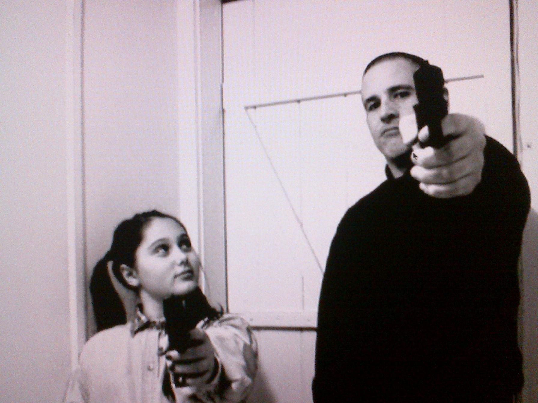 Still of Kimberly Lombardo and Stephen Cook from Aim Point Shoot (2013)