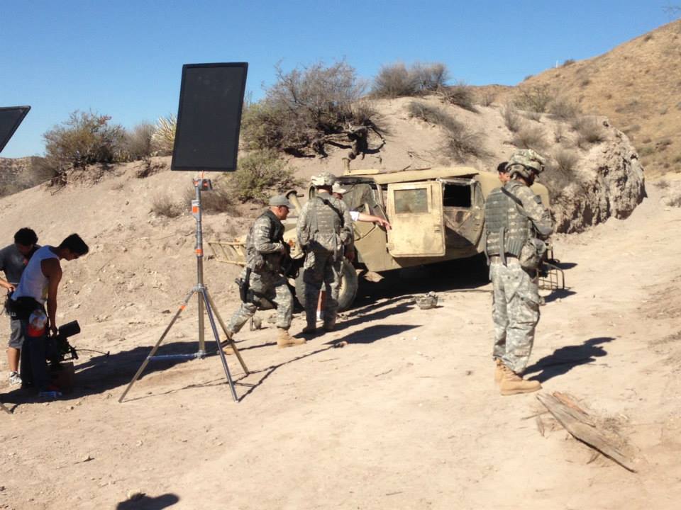 Kyle Valle in full costume giving direction on the set of 'MIRAGE'.