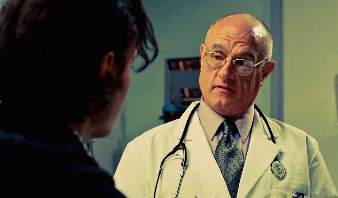 Bobby Reed as Dr. Radcliff in William Mullan's 