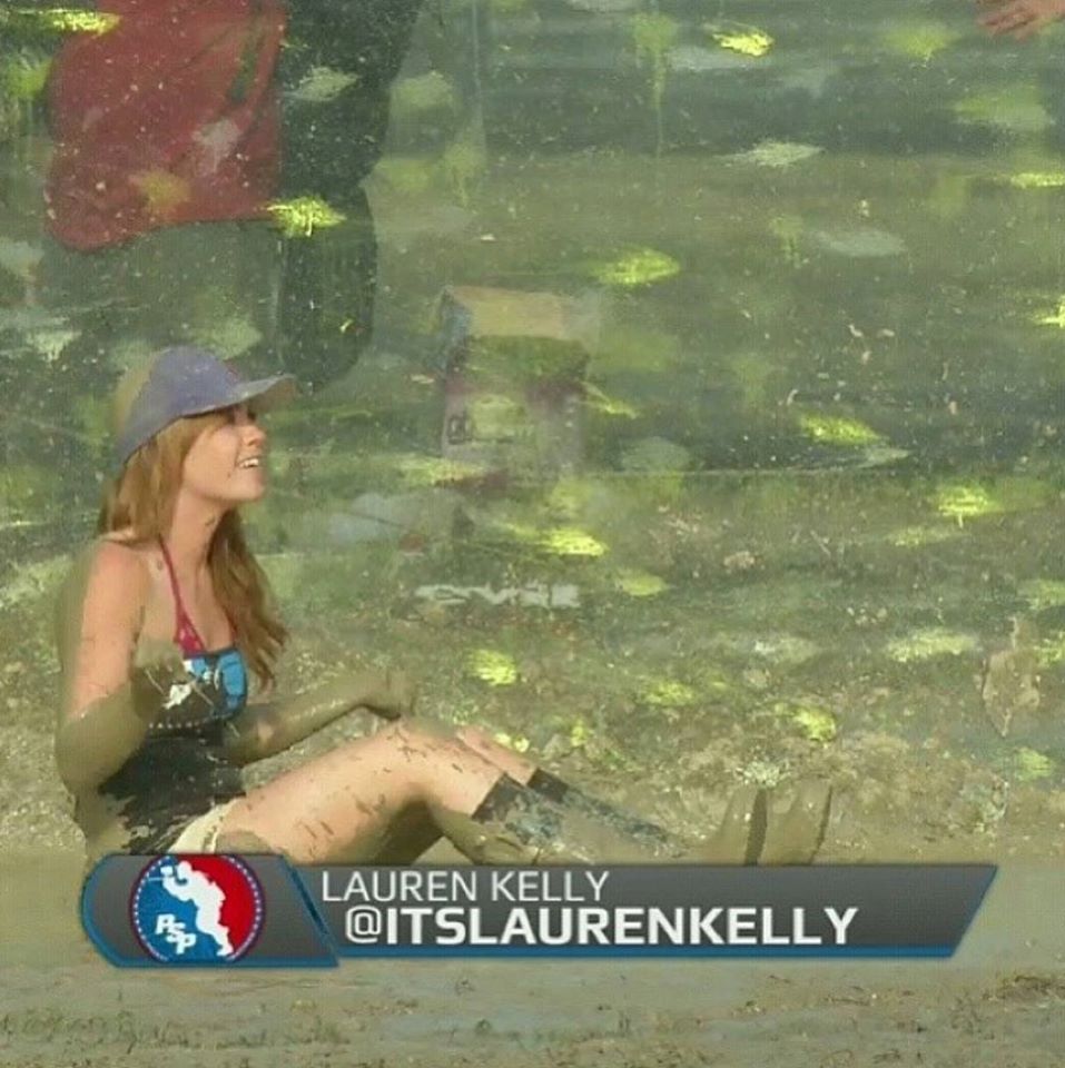 Lauren loses a bet and has to jump in the mud while reporting LIVE from the sidelines.