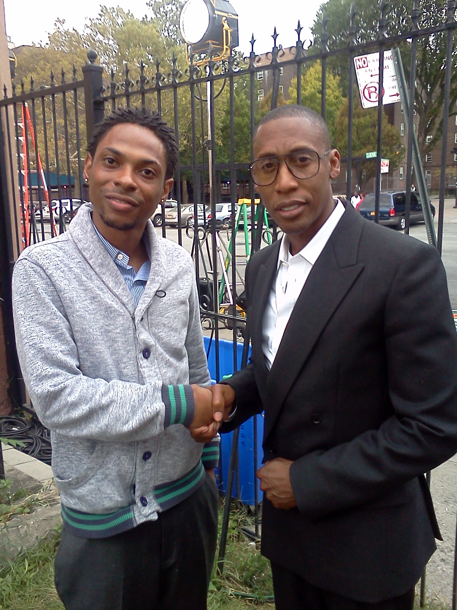 Terry Davis with Raphael Saadiq on movie set 