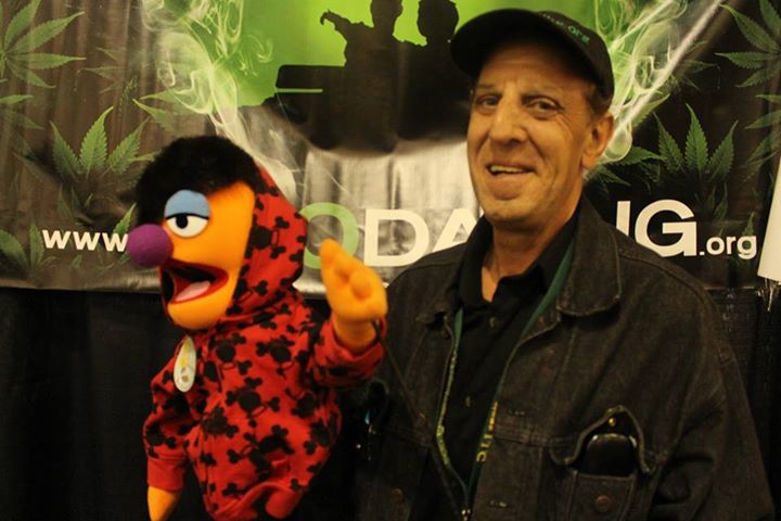 Scott j Migdol Executive Producer filming Green Gold TV show pilot in San Jose California with the puppet Burner.