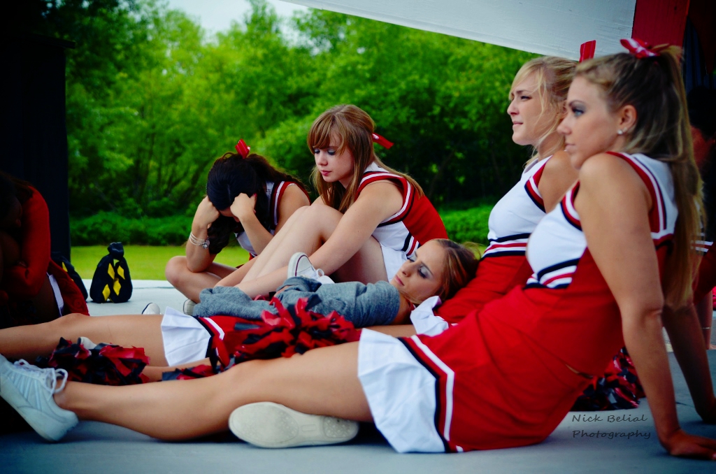 Production still: Carpenter High cheerleaders on the set of Carver