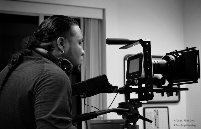 Director Pablo Macho Maysonet IV on the set of The Red Suit