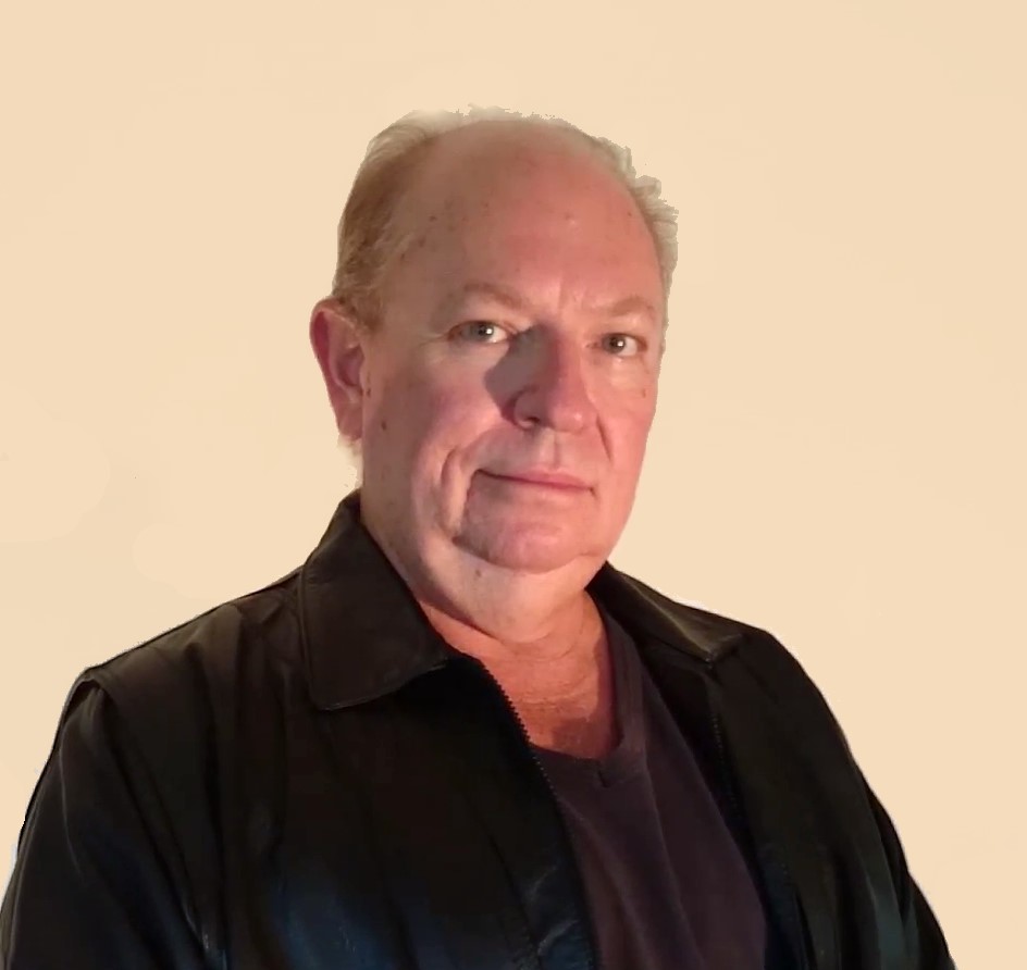 Middle aged man, black leather jacket, black Tshirt, no beard, clean shaven, receding blond hair, mid shot, Gold Coast Queensland Australia