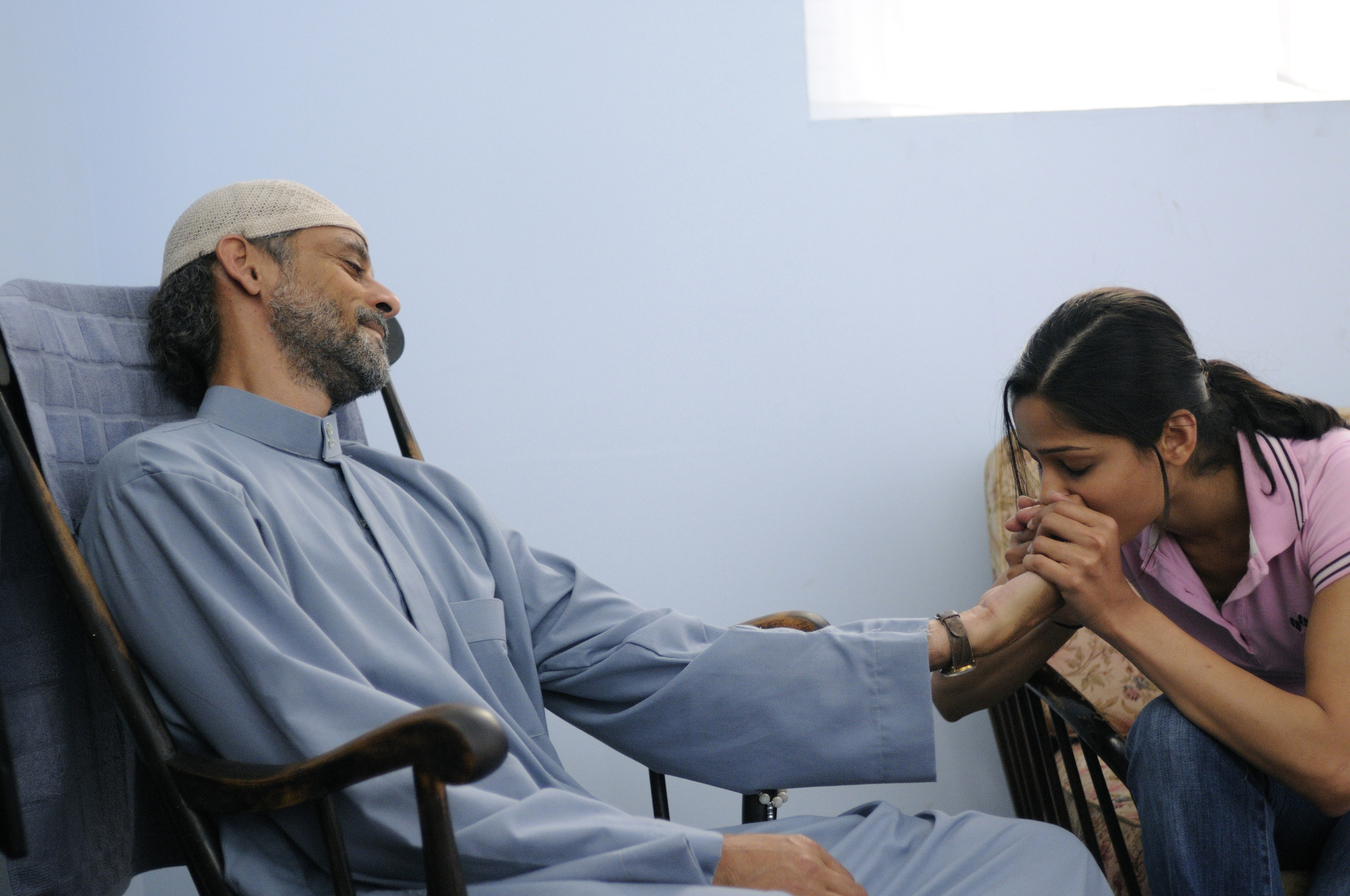 Still of Alexander Siddig and Freida Pinto in Miral (2010)