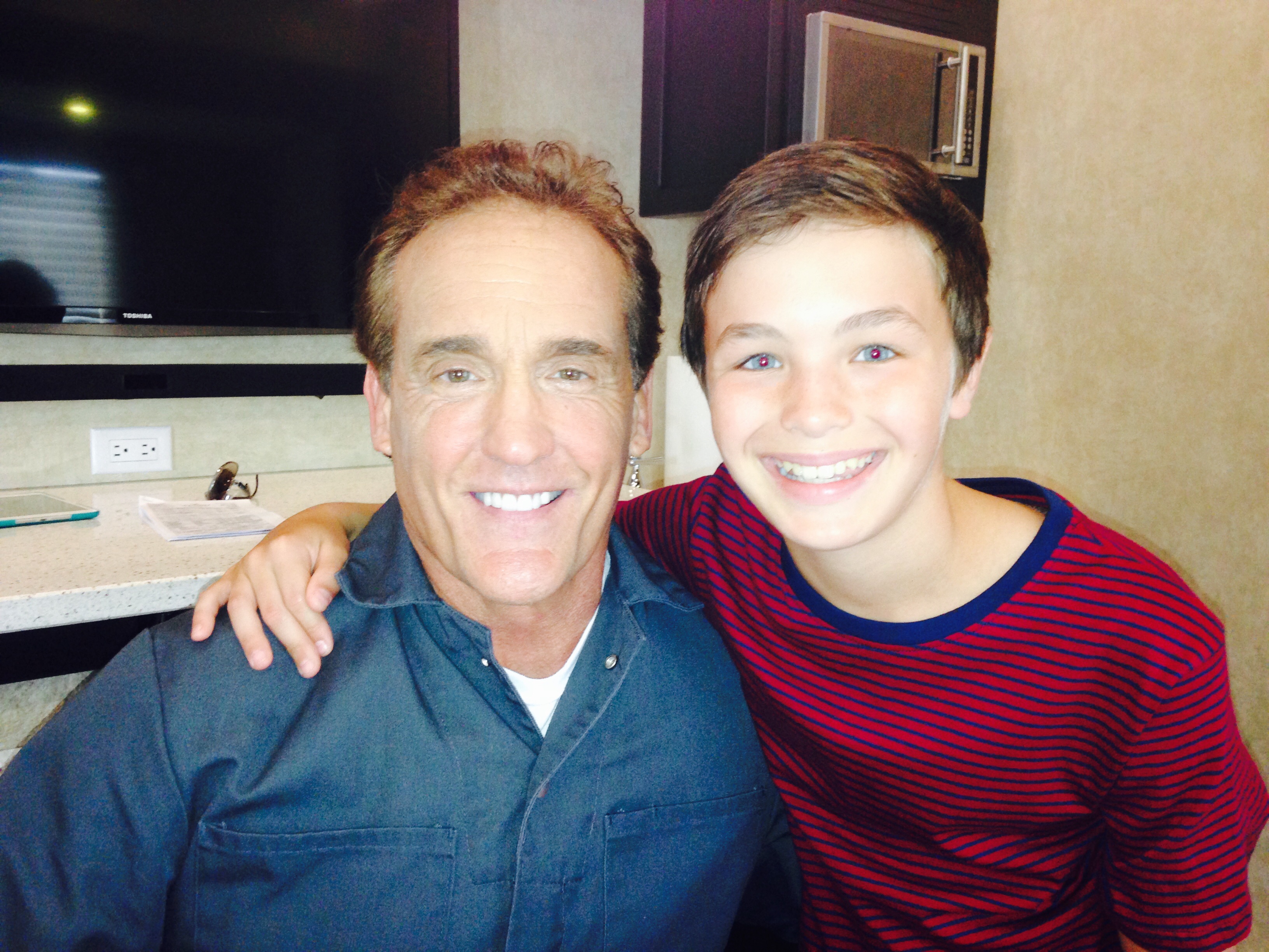 Actor John Wesley Shipp and Logan Williams on the set of 