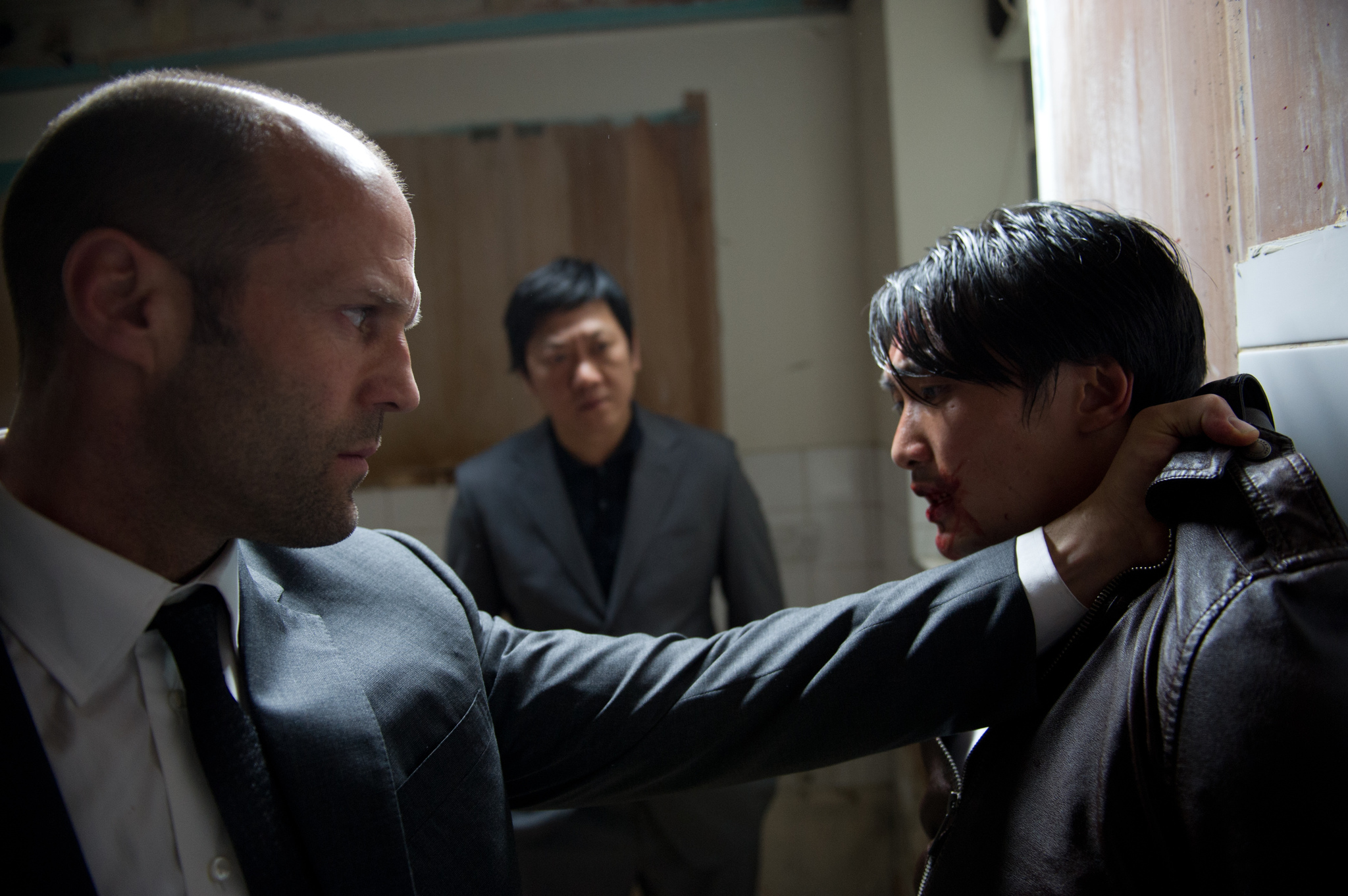 Still of Jason Statham and Aaron Ly in Kolibrio efektas (2013)