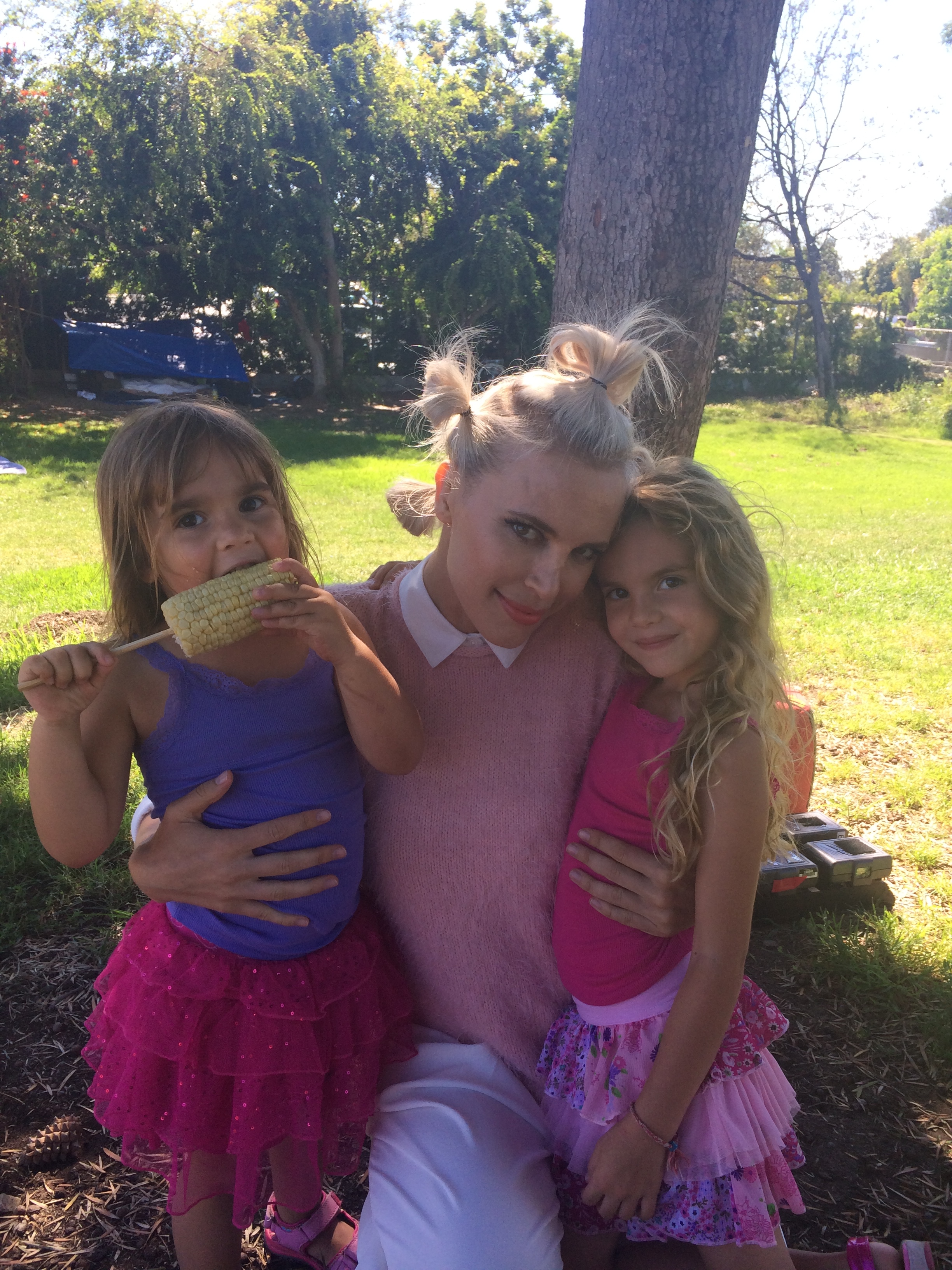 Alana and Eden Lasry with singer Aria Crescendo on the set of the music video for Aria's remake of 