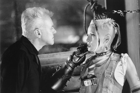 Still of Malcolm McDowell and Lori Petty in Tank Girl (1995)