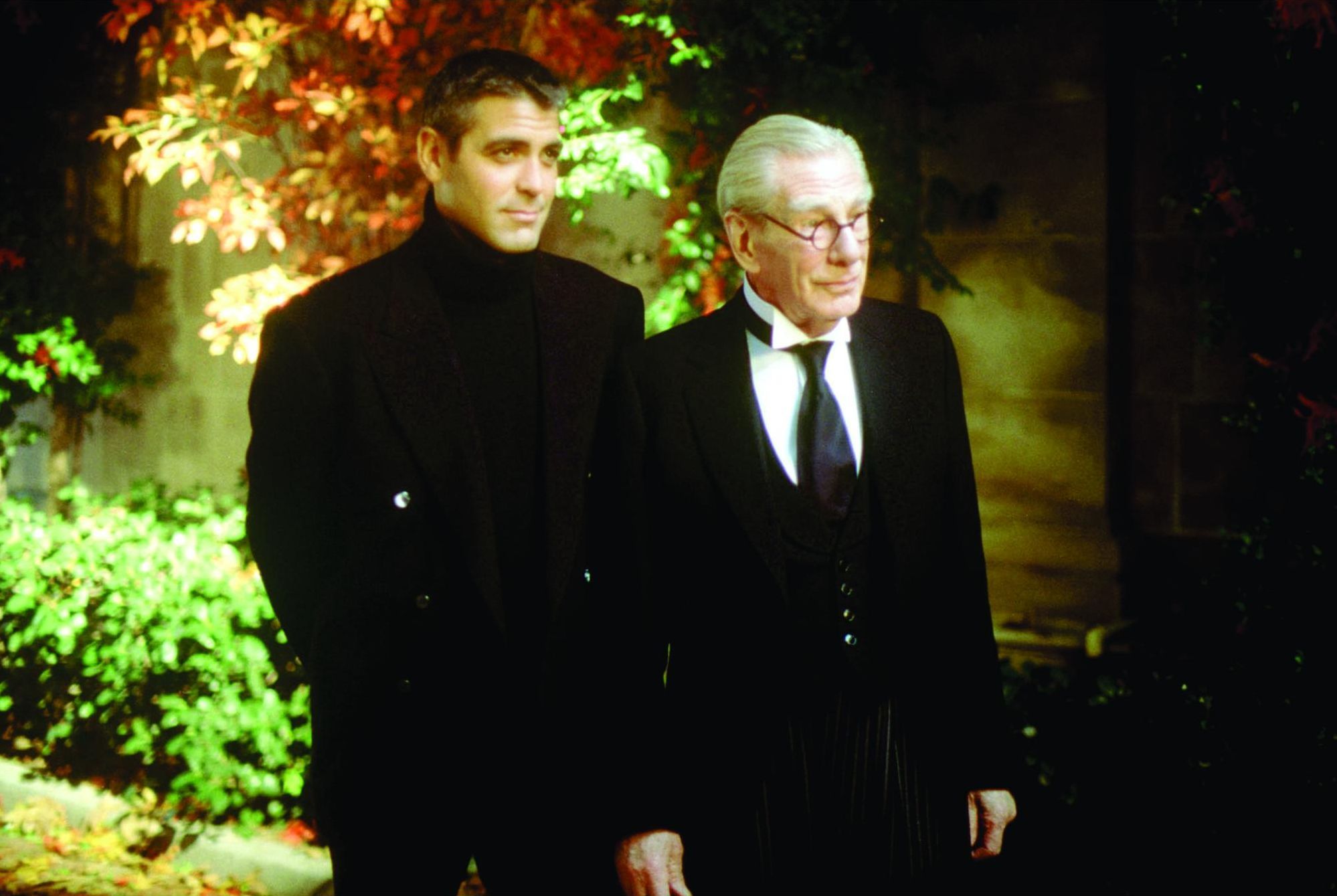 Still of George Clooney and Michael Gough in Batman & Robin (1997)