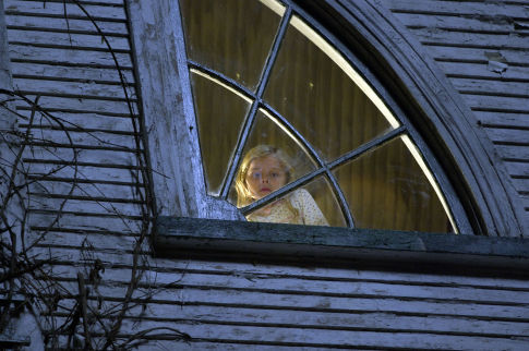 CHLOE MORETZ stars as Chelsea Lutz in THE AMITYVILLE HORROR.