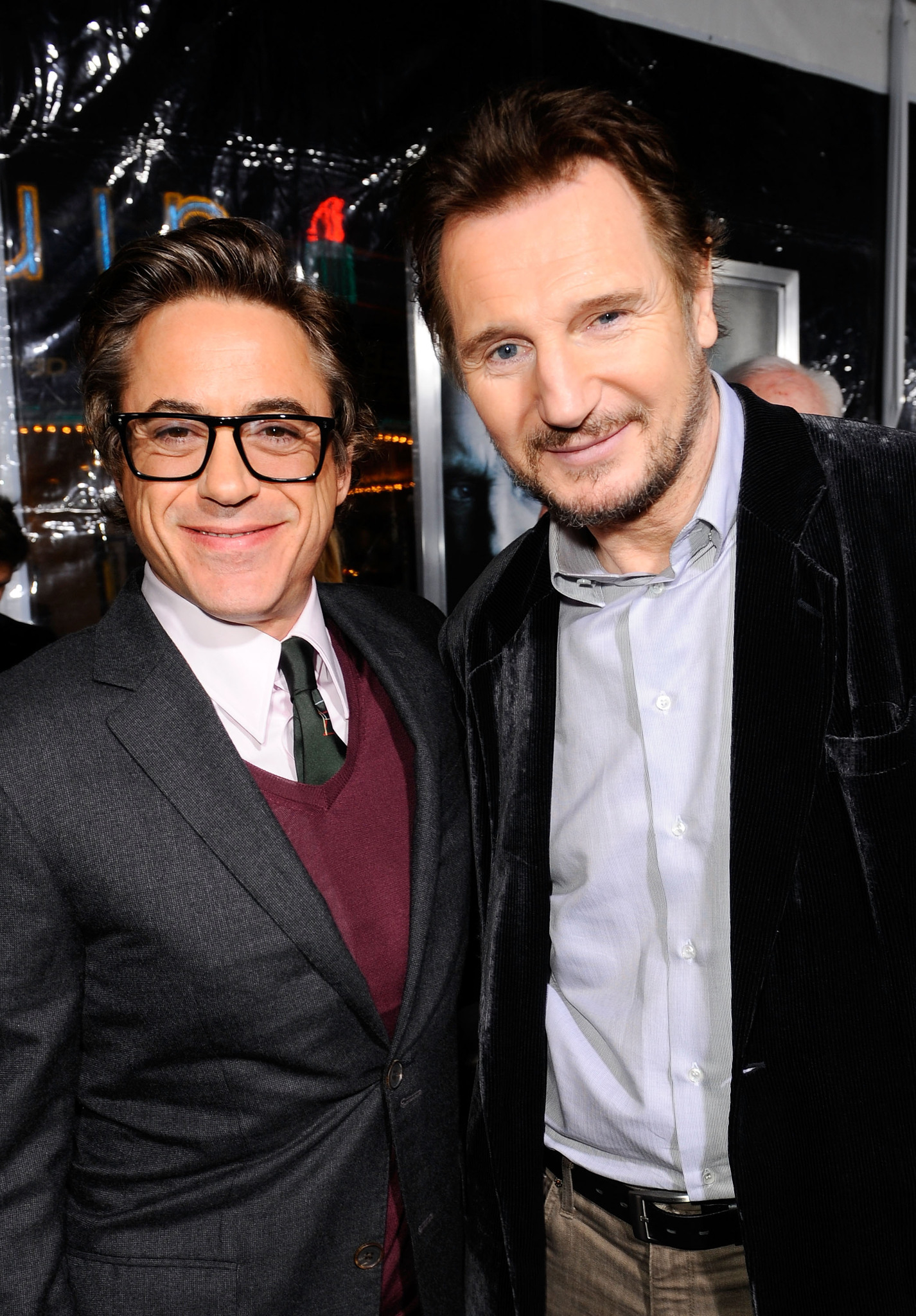 Robert Downey Jr. and Liam Neeson at event of Nezinomas (2011)