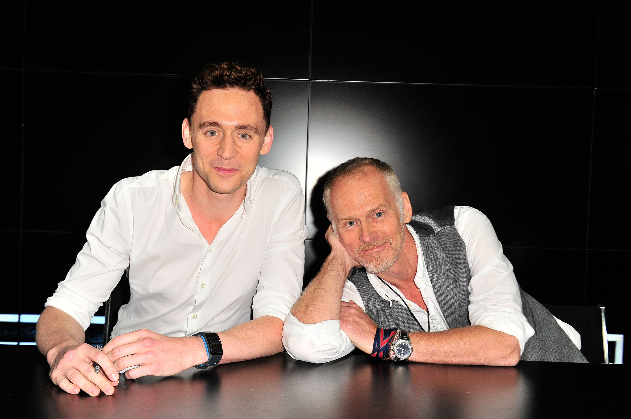 Alan Taylor and Tom Hiddleston at event of Toras: Tamsos pasaulis (2013)