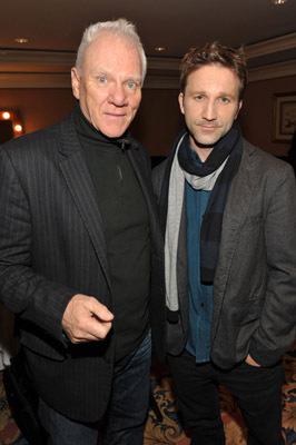 Malcolm McDowell and Breckin Meyer