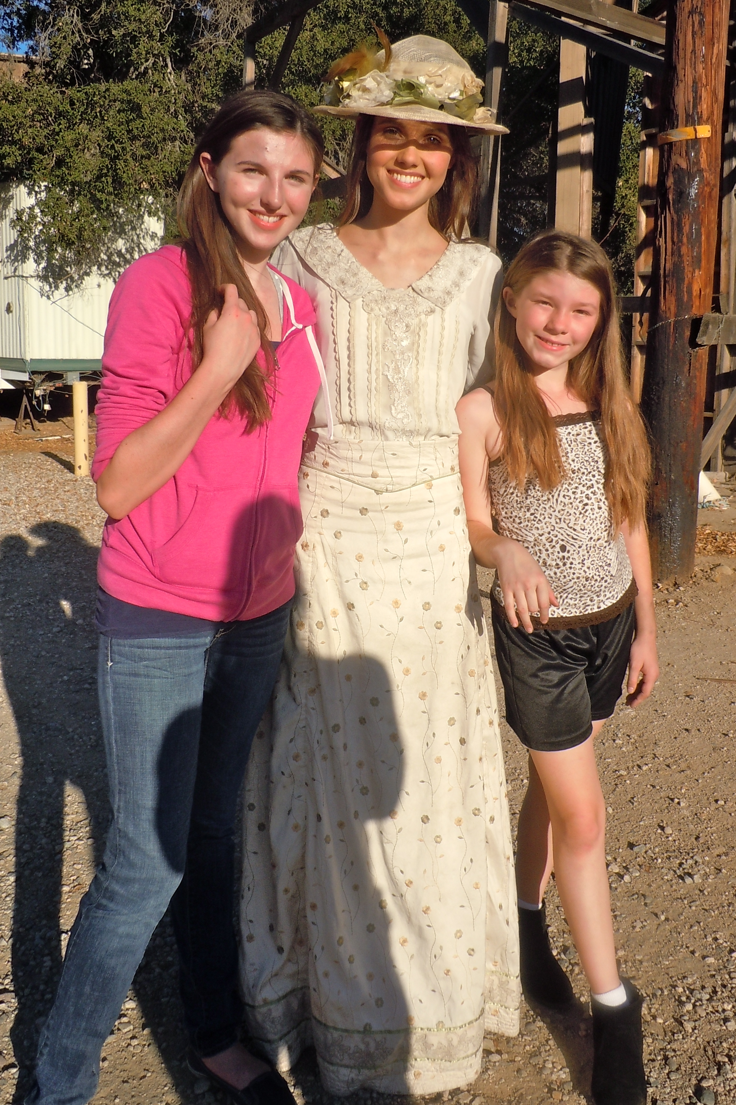 Kendra, Maggie Grace, and Kylie Burkholder, filming on When Calls the Heart.