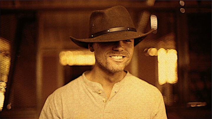 David Brackett as a psychotic ranch hand in the film JENNY.