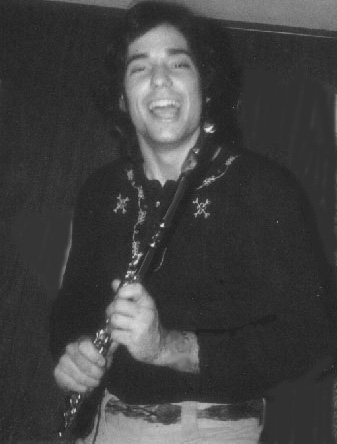 Coyote Finds His Flute. This was taken before leaving San Diego in 1978. Maybe it was that nickel flute that put a smile on my face. I still have that Selmer-Bundy flute and have used it on every record except my most recent. Best $75 I ever spent.