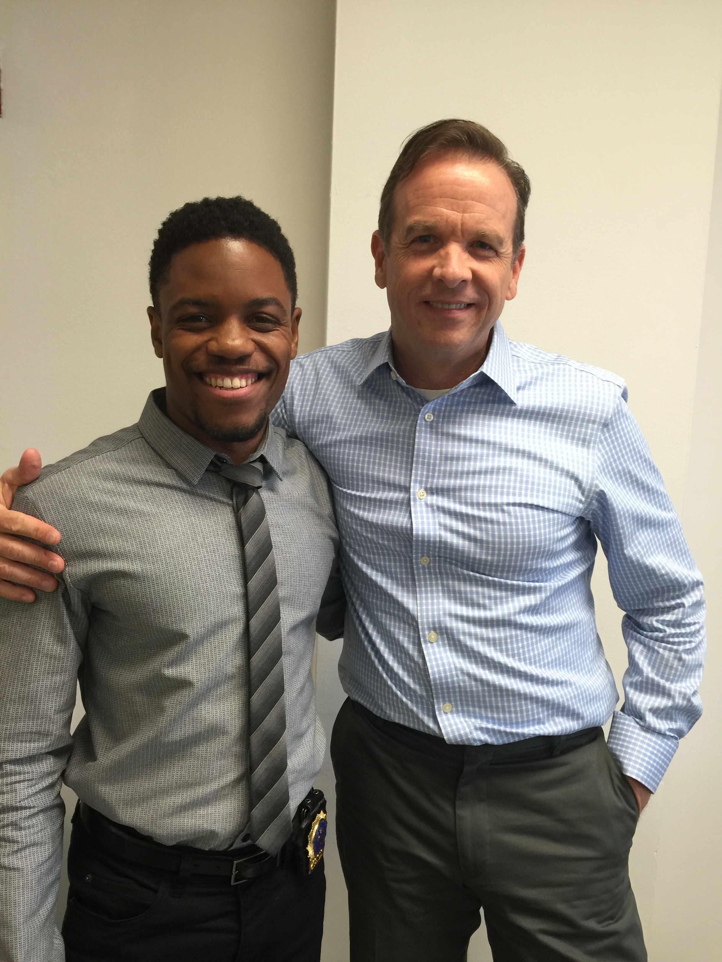 Jon Michael Hill and Donald Sage Mackay on the set of ELEMENTARY