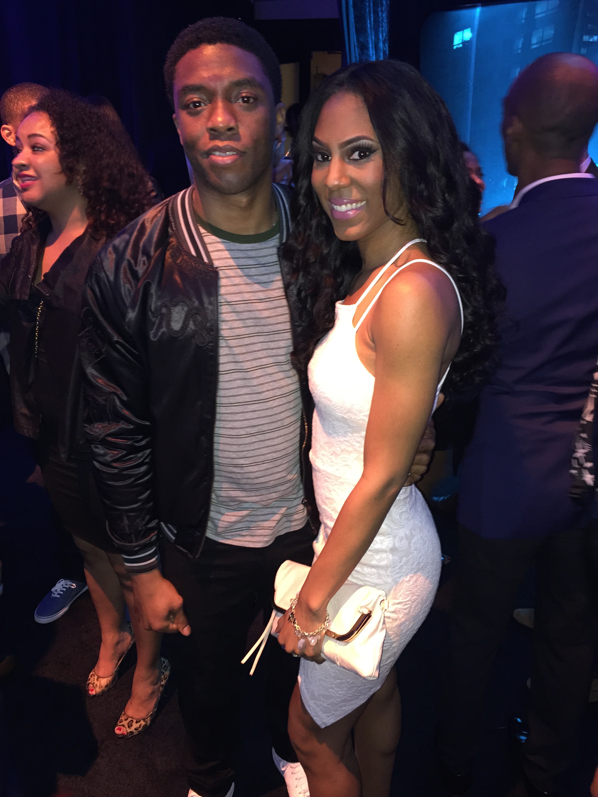 Brittney Q. Hill and Chadwick Boseman