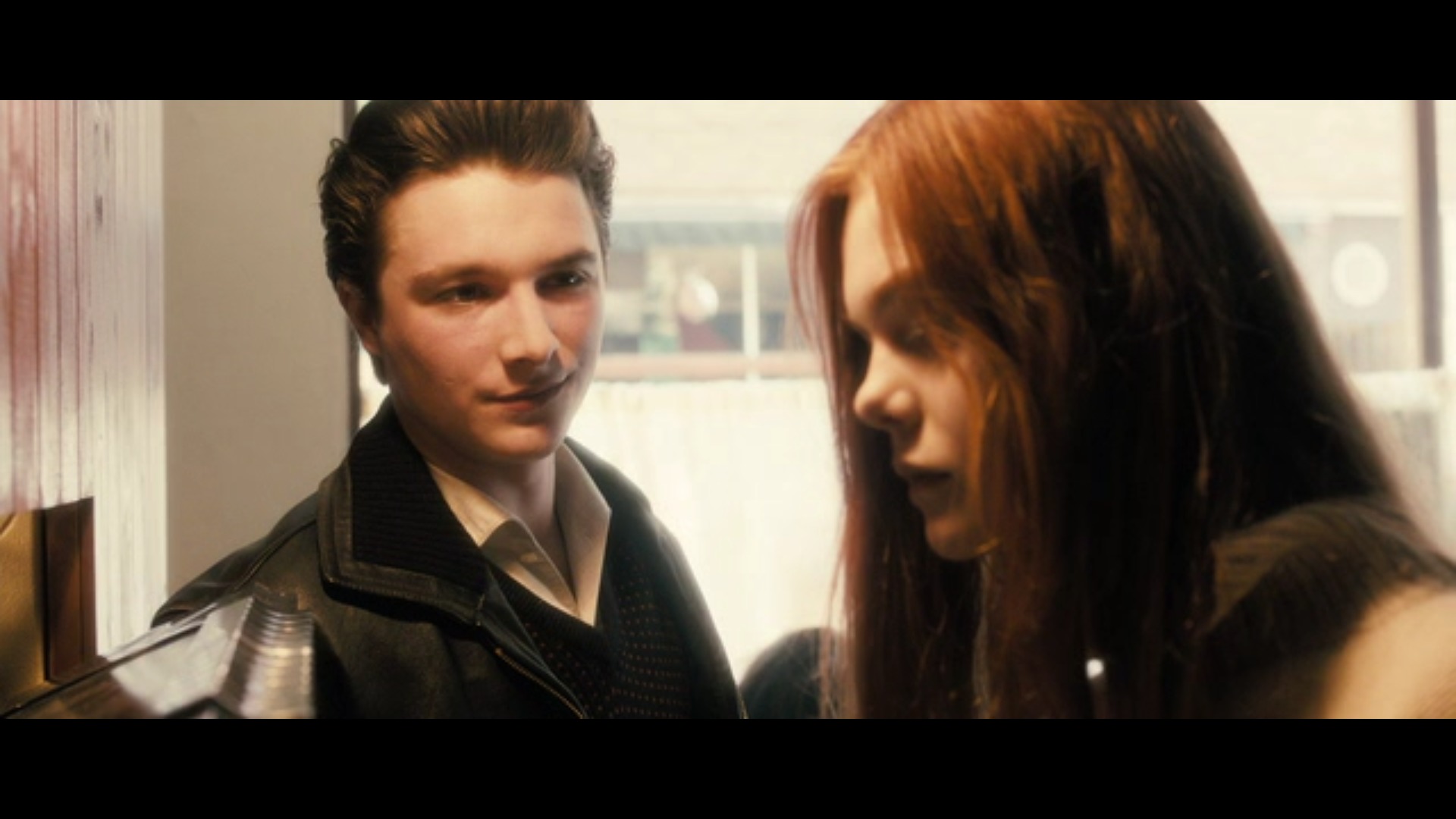 Still of Rory Finn (as Rory James) and Elle Fanning in 'Ginger and Rosa'