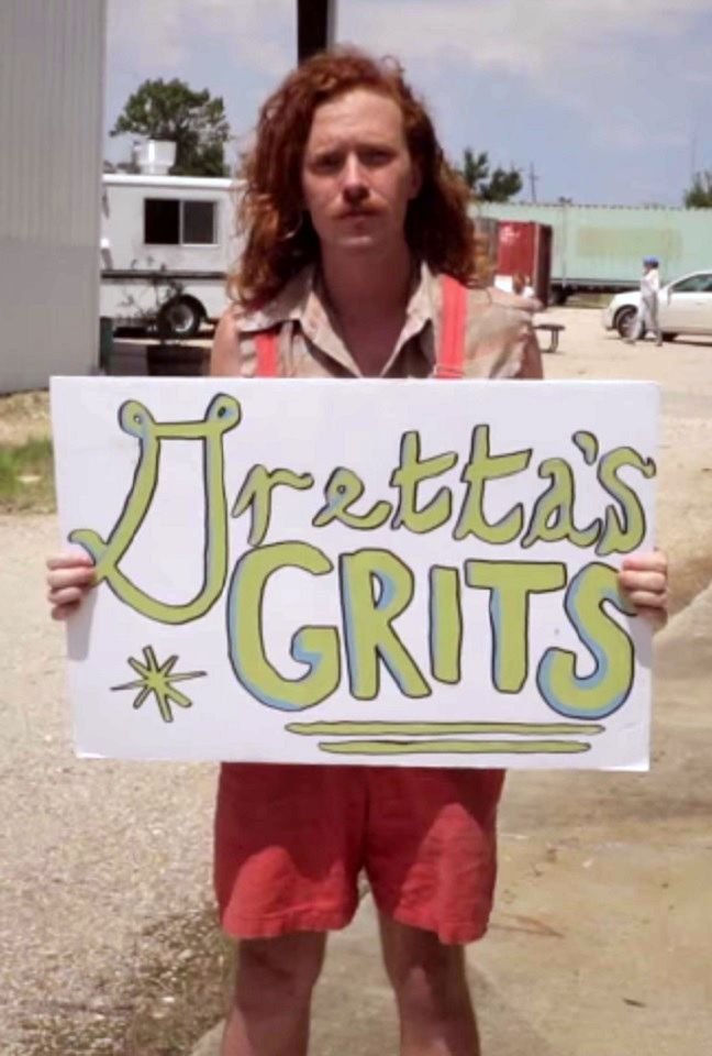 Guy drumming up business for his mom's food truck.