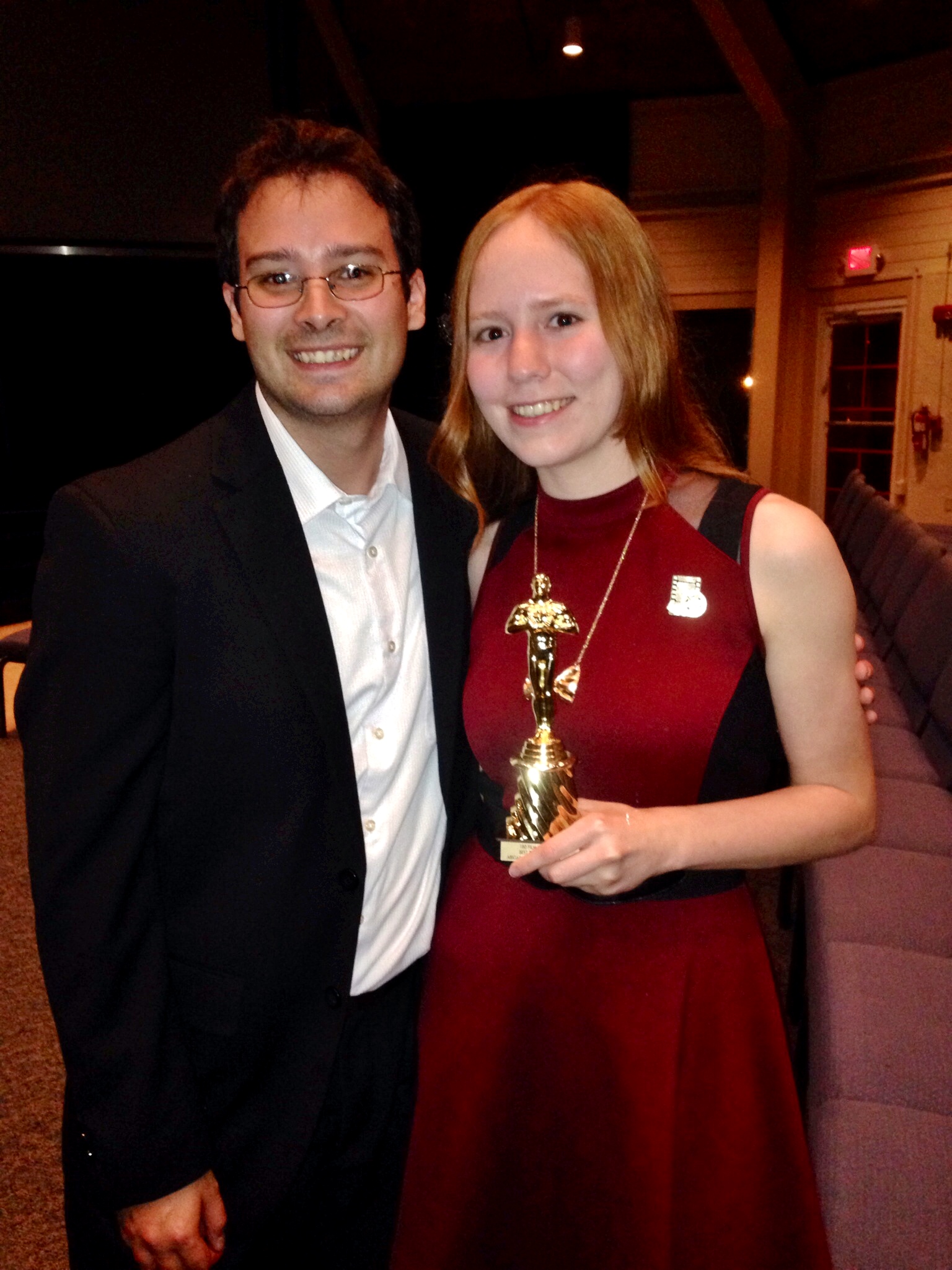 Abigail Rodriguez after winning Best Editor for a 6min Film in the 2014 180 Film Festival standing alongside editor and film maker James Tikunoff.