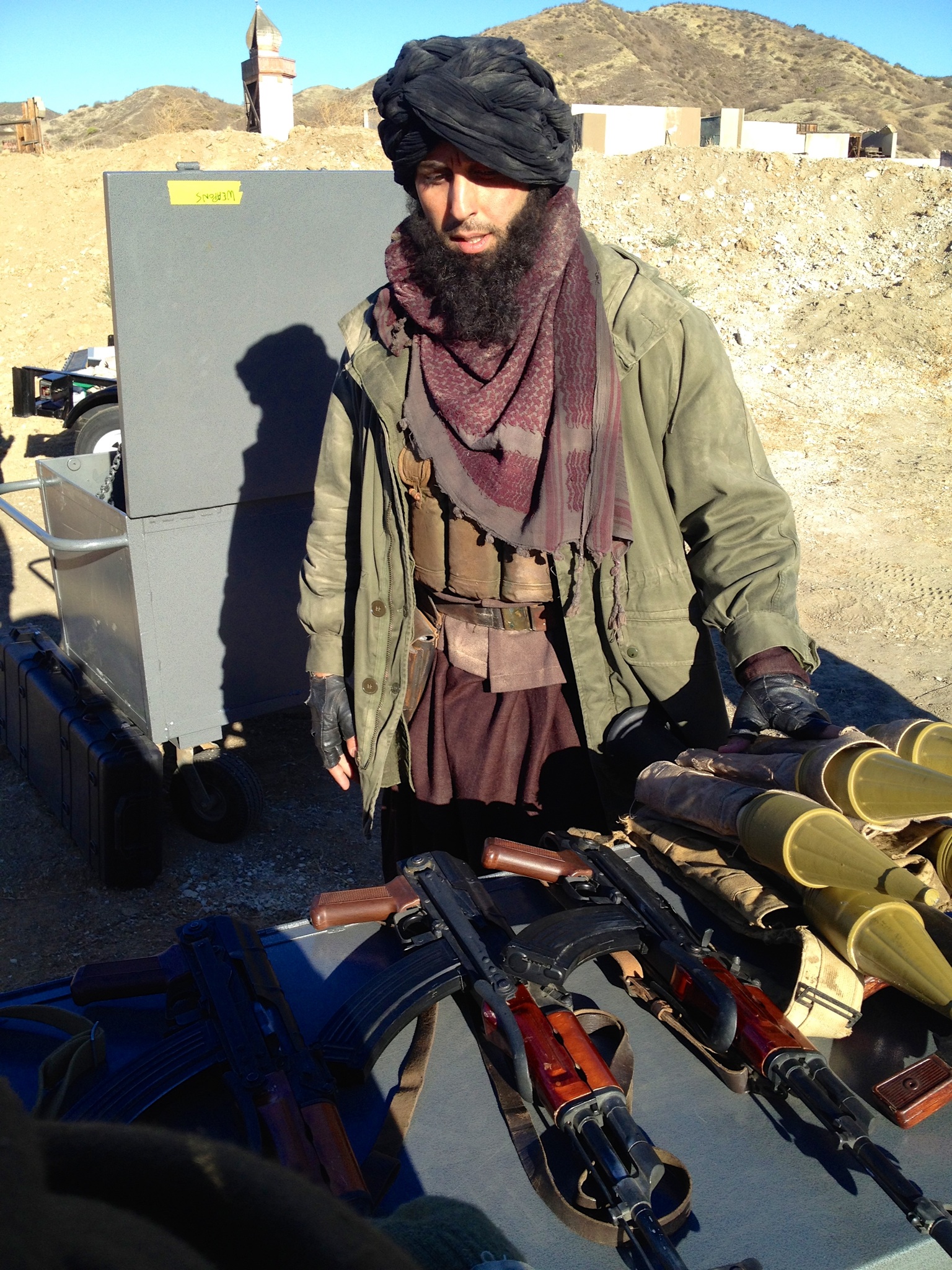 Sam Sheikhan on set of NCIS:LA playing an armed insurgent...