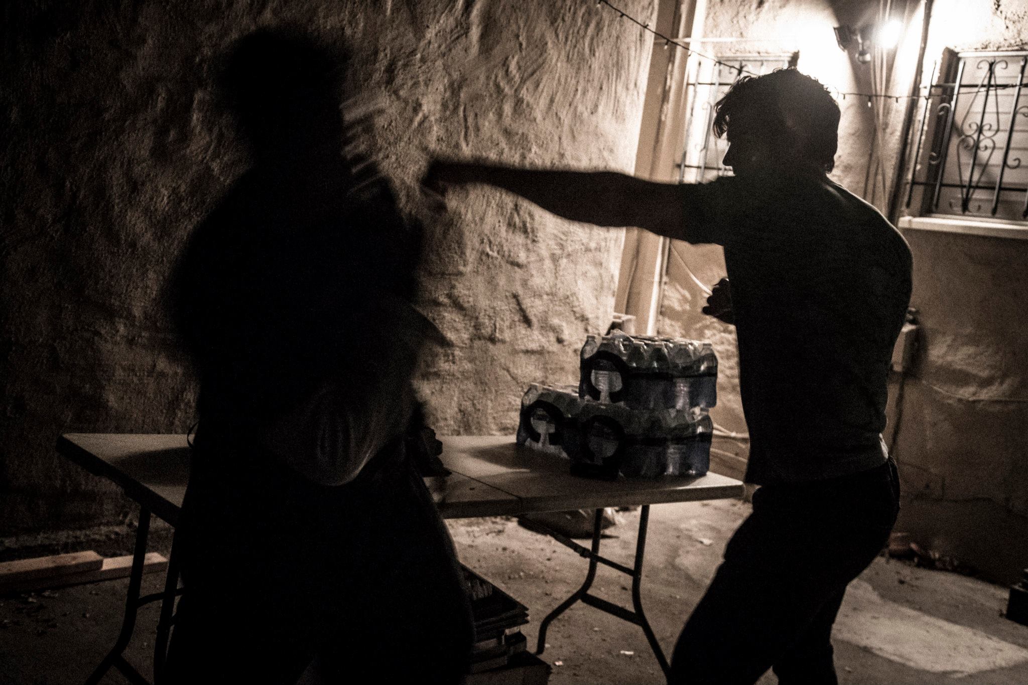 Rehearsing fight choreography on the set of Fight to the Finish.