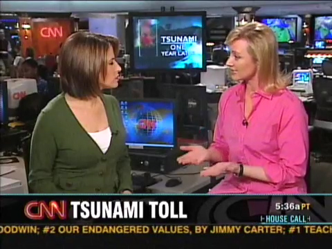 CNN Correspondent Alex Quade (on right) live on set interview at CNN Headquarters in Atlanta, Georgia with Elizabeth Cohen (on left) for 