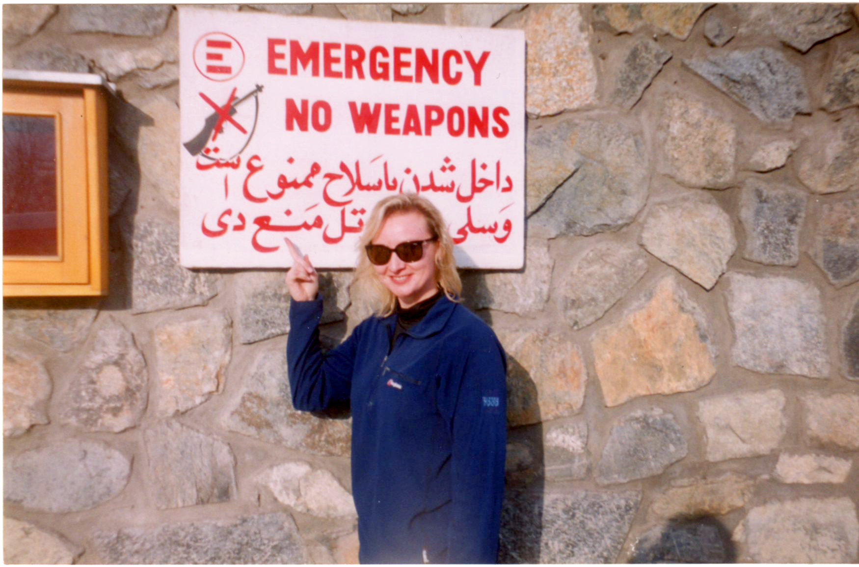 War Reporter Alex Quade for CNN, outside the ER hospital in Kabul, Afghanistan, 2002. No weapons, no AK-47's allowed inside.