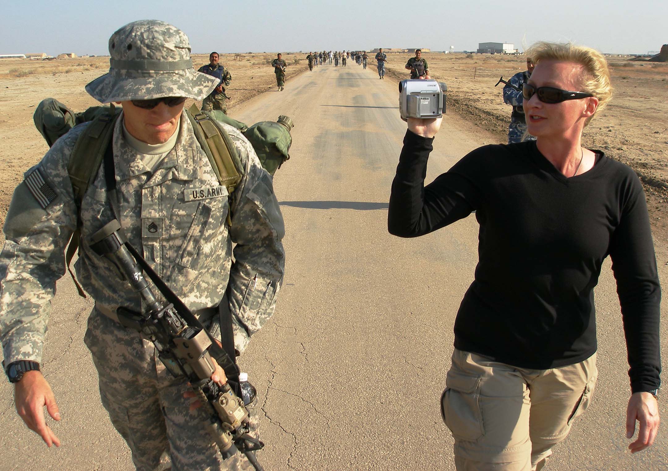War Reporter Alex Quade interviews Green Beret Medic Tim, during patrol with Iraqi Special Forces, for her film 