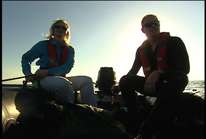 War Reporter Alex Quade in zodiac raft with elite Pararescue-diver, for her 
