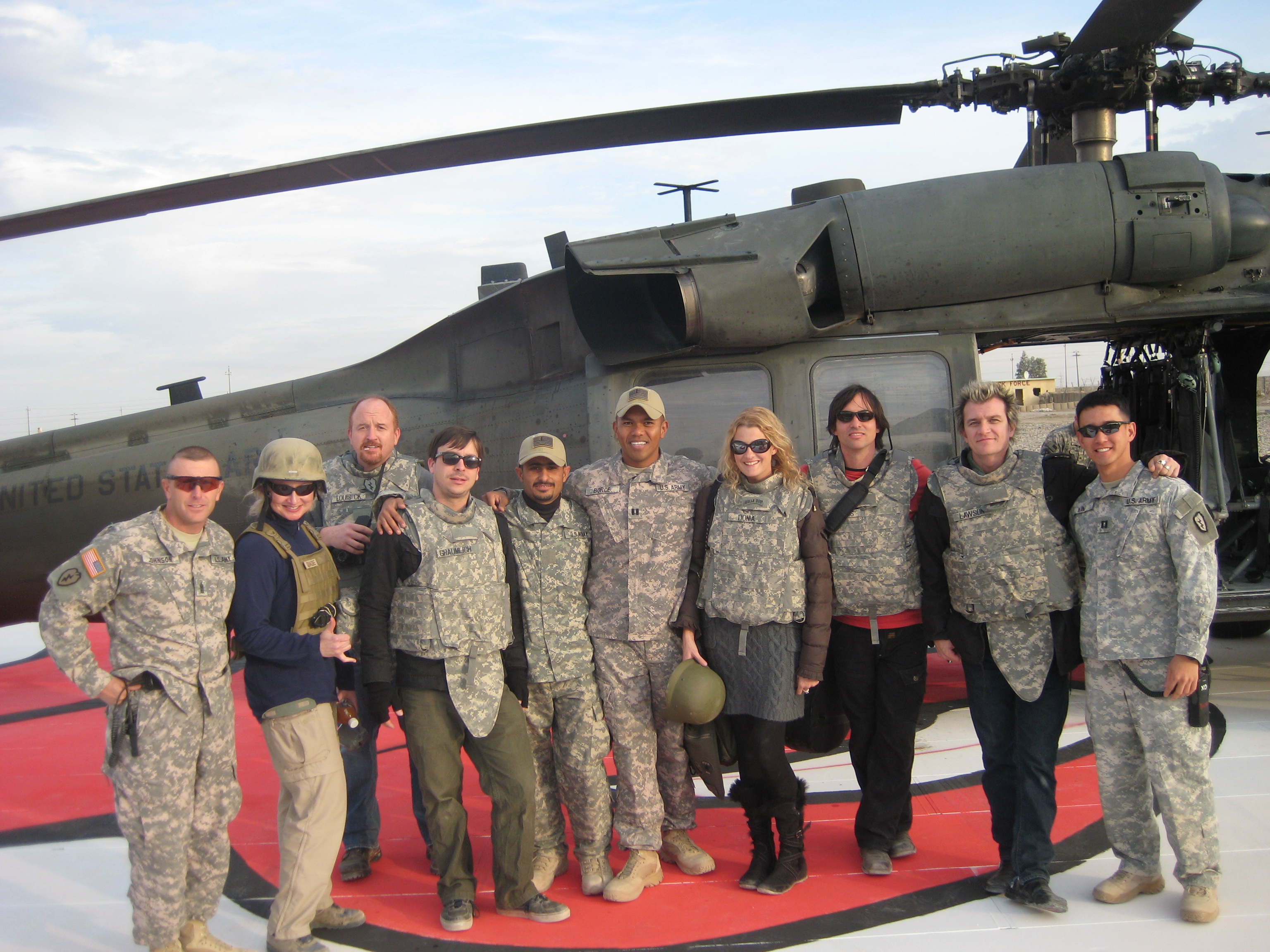 War Reporter Alex Quade hitchhikes to remote firebases and combat outposts with USO Tour, including award-winning comedian Louis C.K., and country singer and 