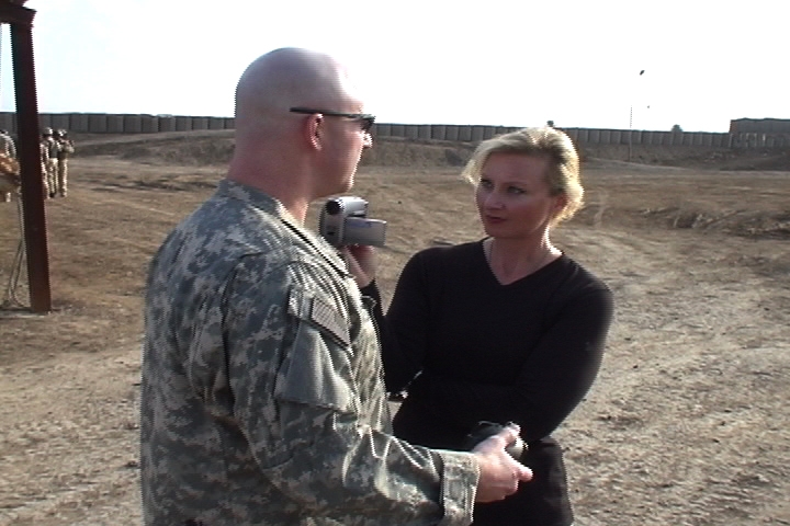 War Reporter Alex Quade interviews Special Forces soldier at a secret fire-training range in Iraq, 2008.