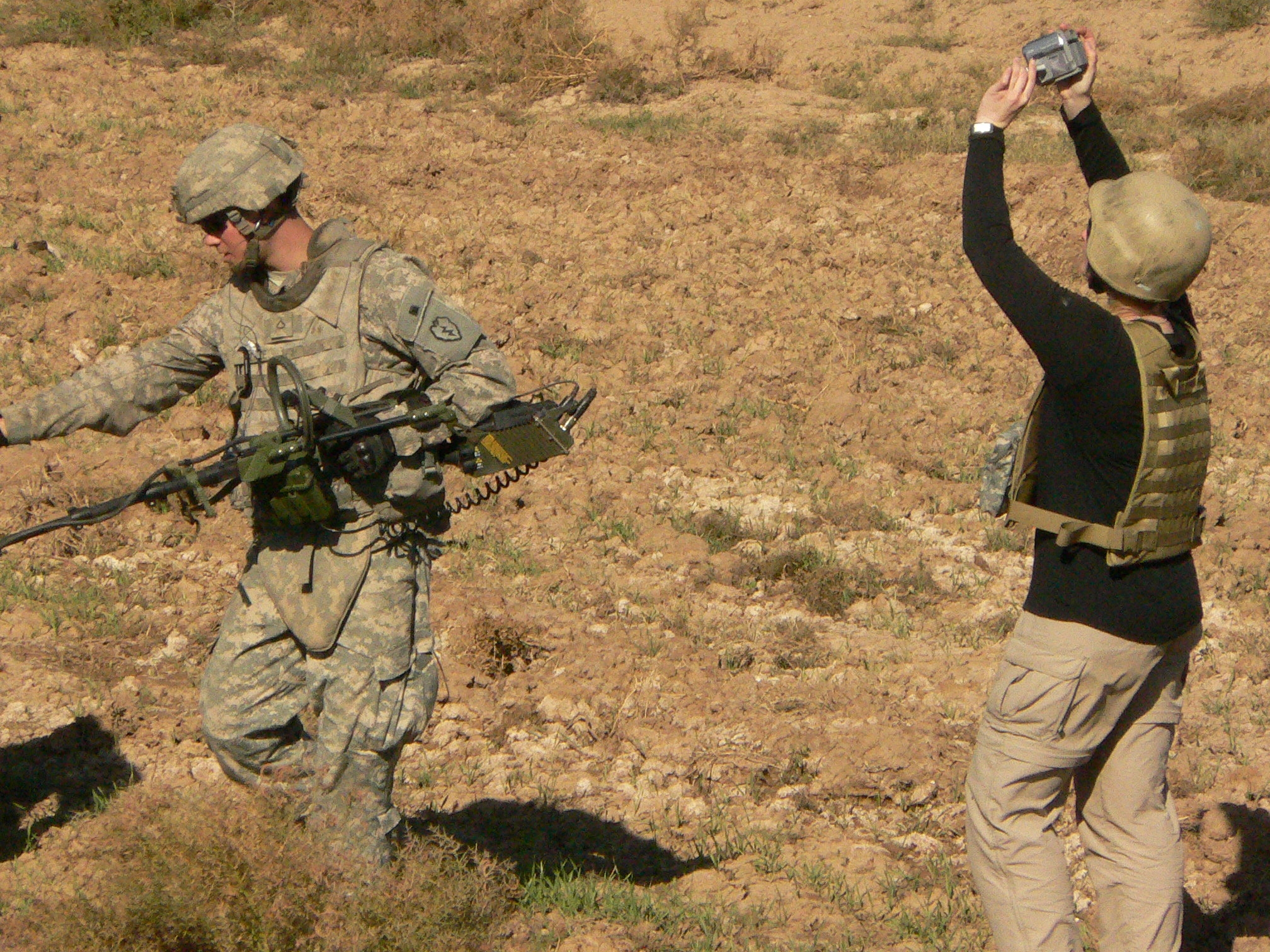 War Reporter Alex Quade shooting video of counter-IED team in Iraq, 2008.