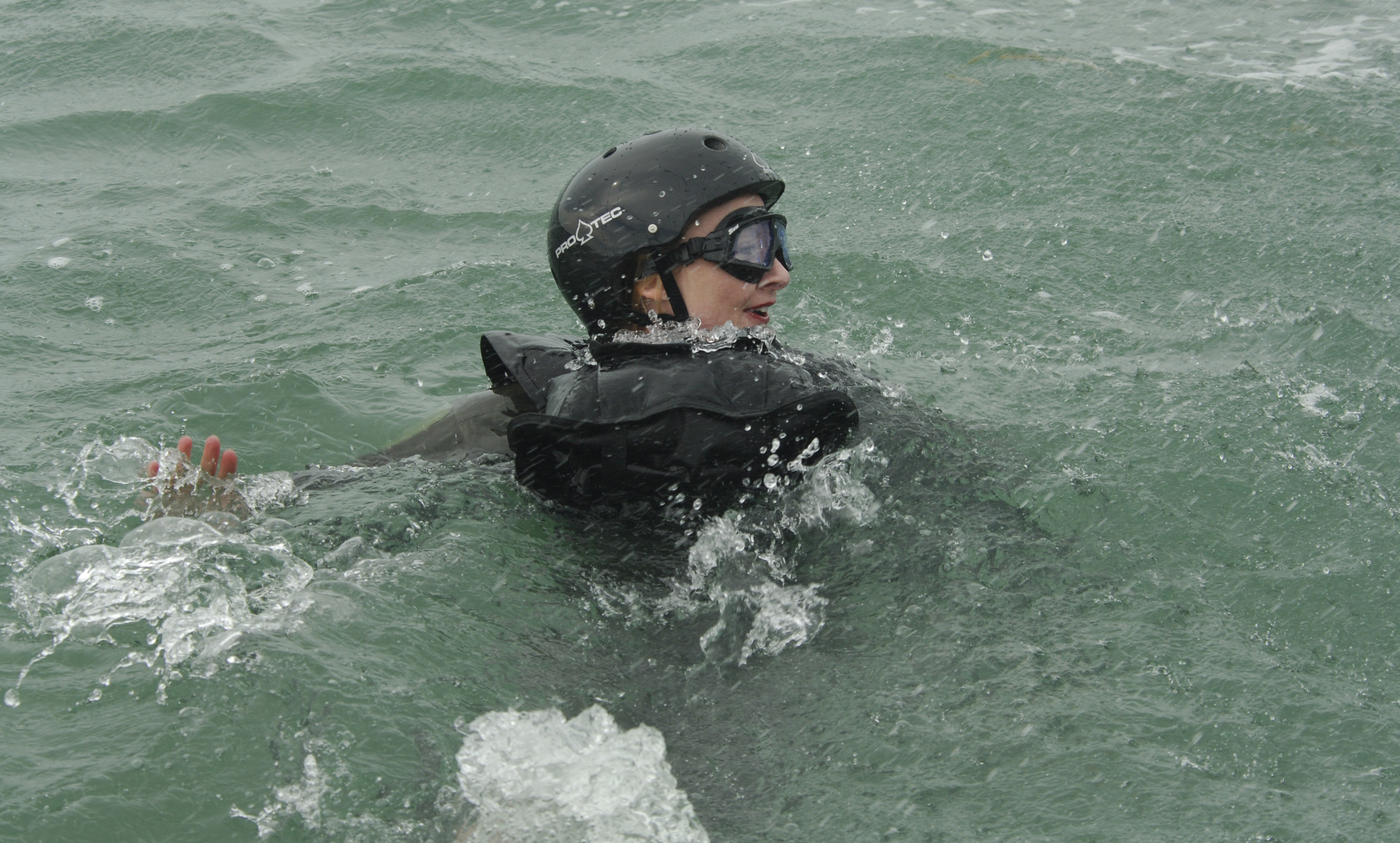 War Reporter Alex Quade, thrown into the sea, awaiting Combat Search & Rescue swimmers and helicopters, for her special series for CNN.