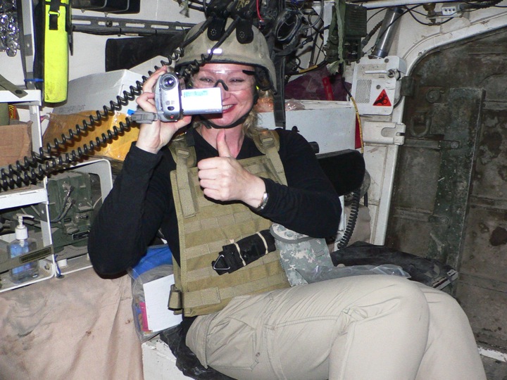 War Reporter Alex Quade on mission in Iraq. Inside Stryker vehicle on route to Combat Outpost Pirelli. 2008.