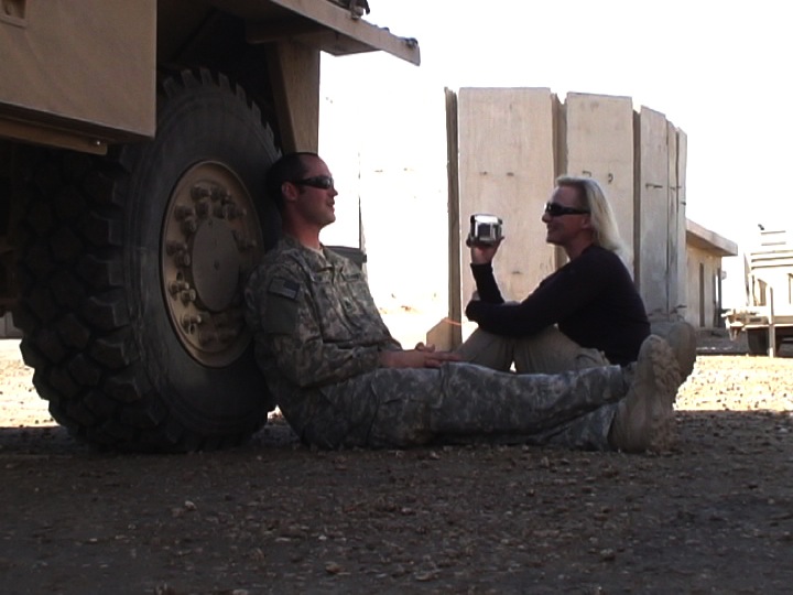 War Reporter Alex Quade interviews Special Forces Soldier between missions in Iraq. 2008.