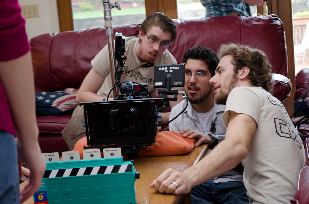 Production still of (left to right) gaffer Phillip Bolzman, Director of Photography Alex Lerma, and Nathan Jacobson on the set of Wanted (2014).