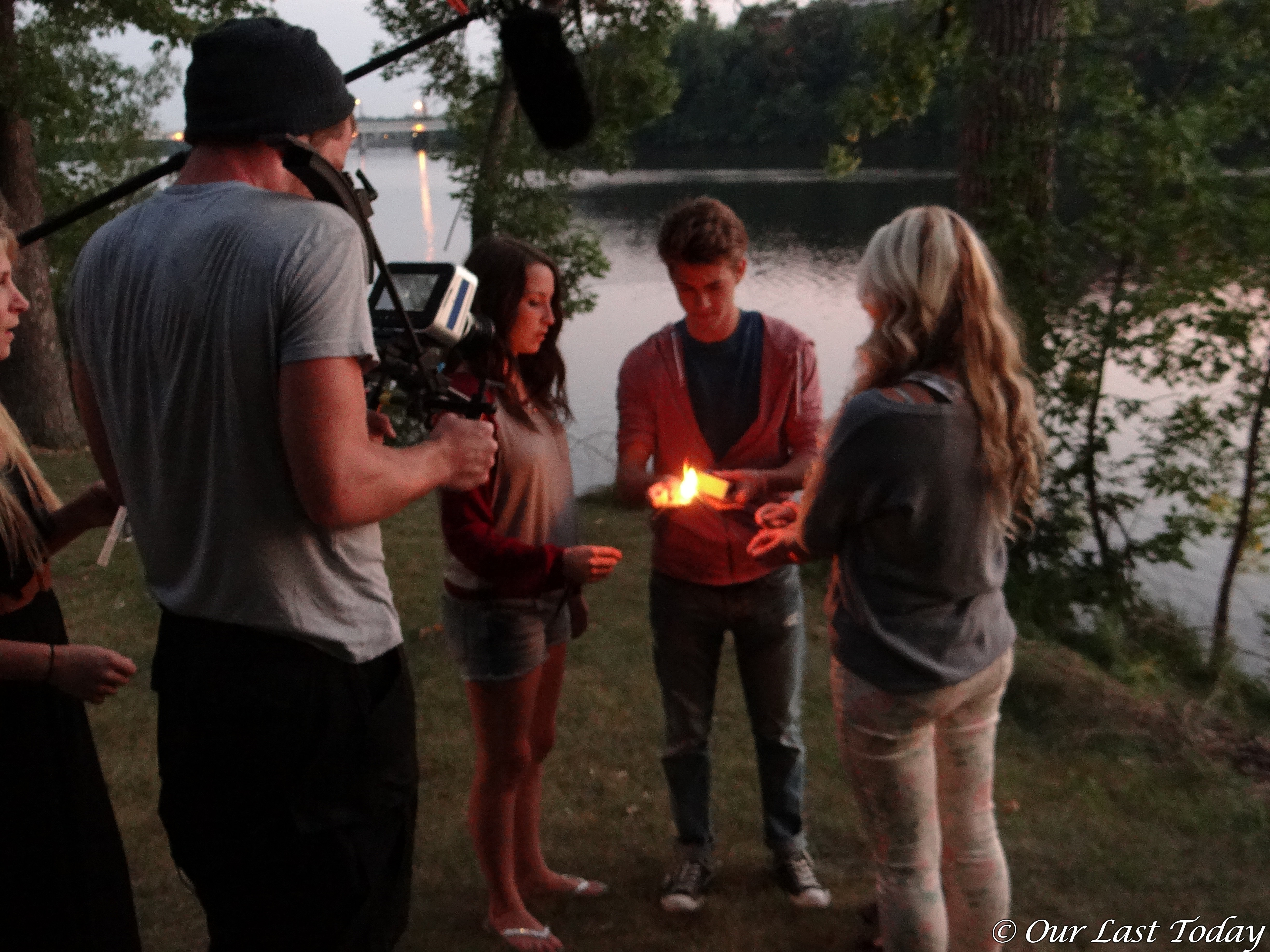 Filming a riverside sparkler sequence next to the Mississippi River.