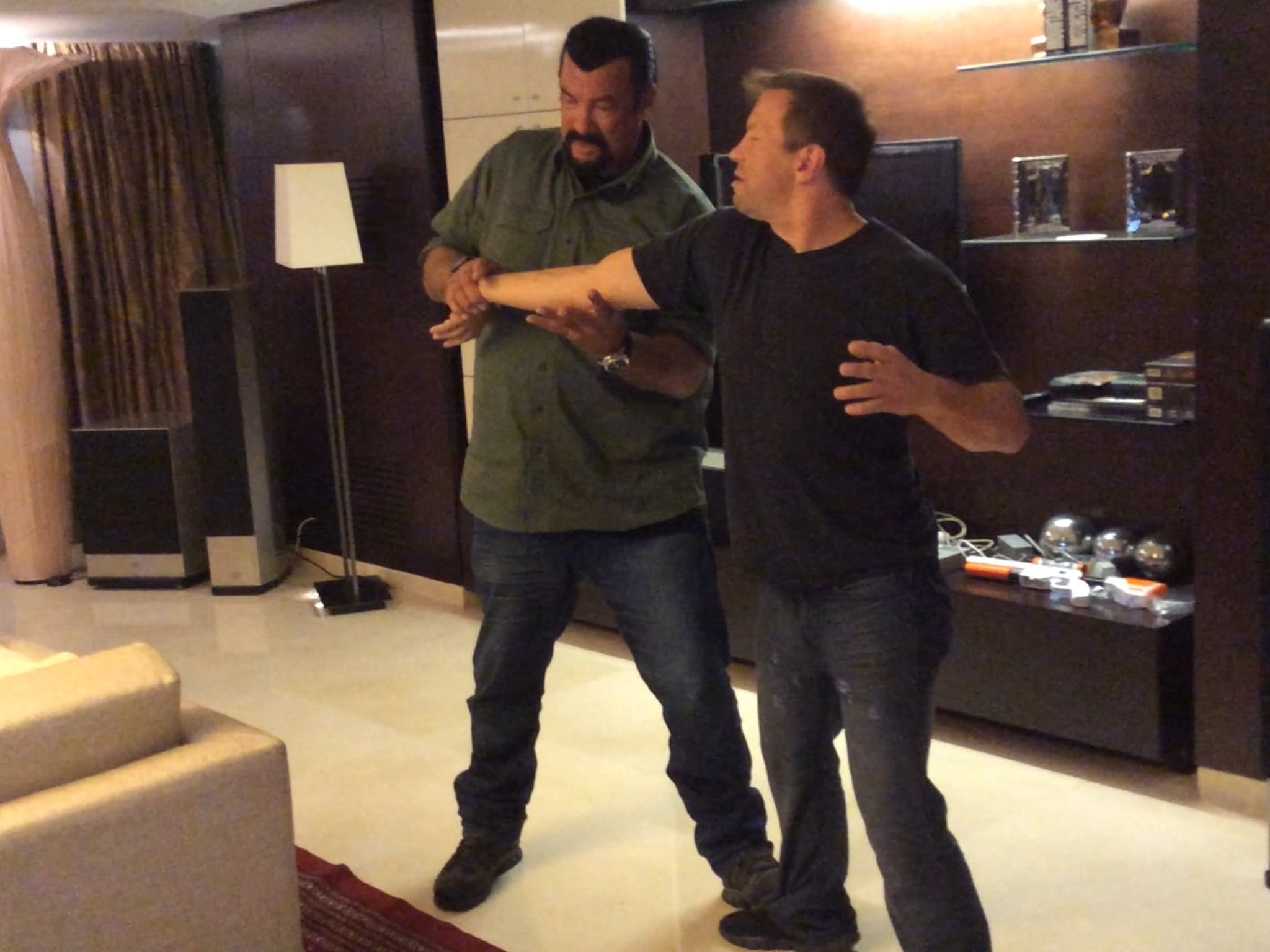Steven Seagal and Ron Balicki going over choreography for their fight scene in Absolution.